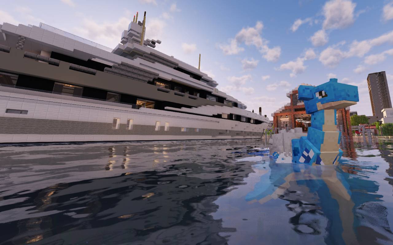 Lapras w porcie obok jachtu